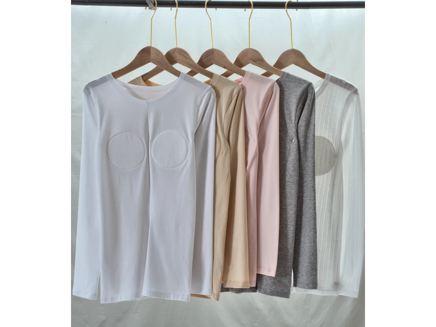 Six colourways of a ribbed long-sleeve top with sewn-in cup padding